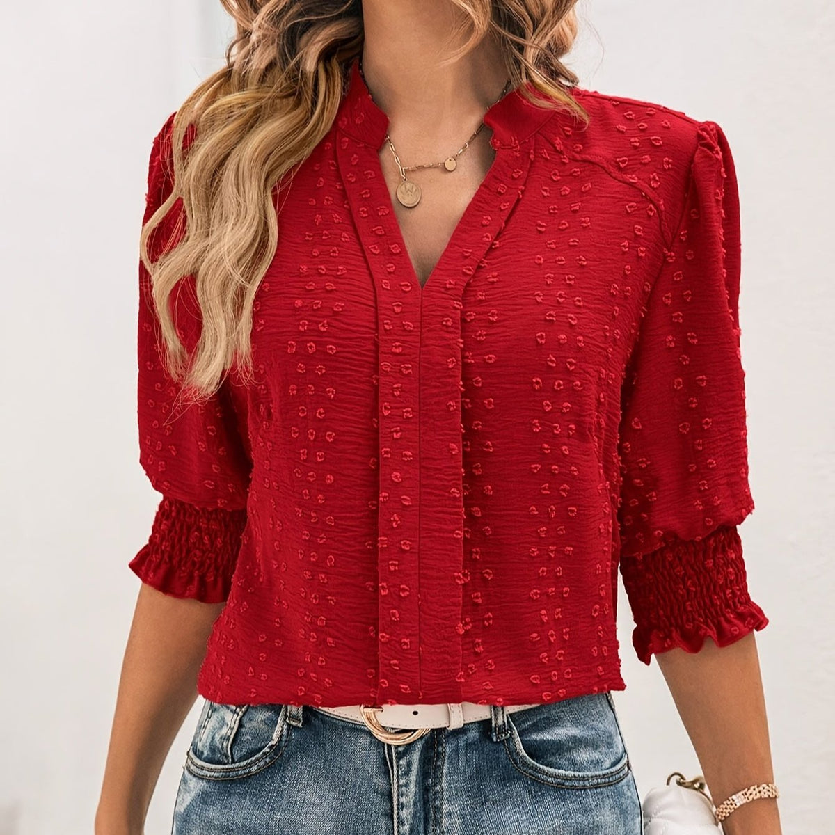 Blusa com detalhes franzidos com decote em v