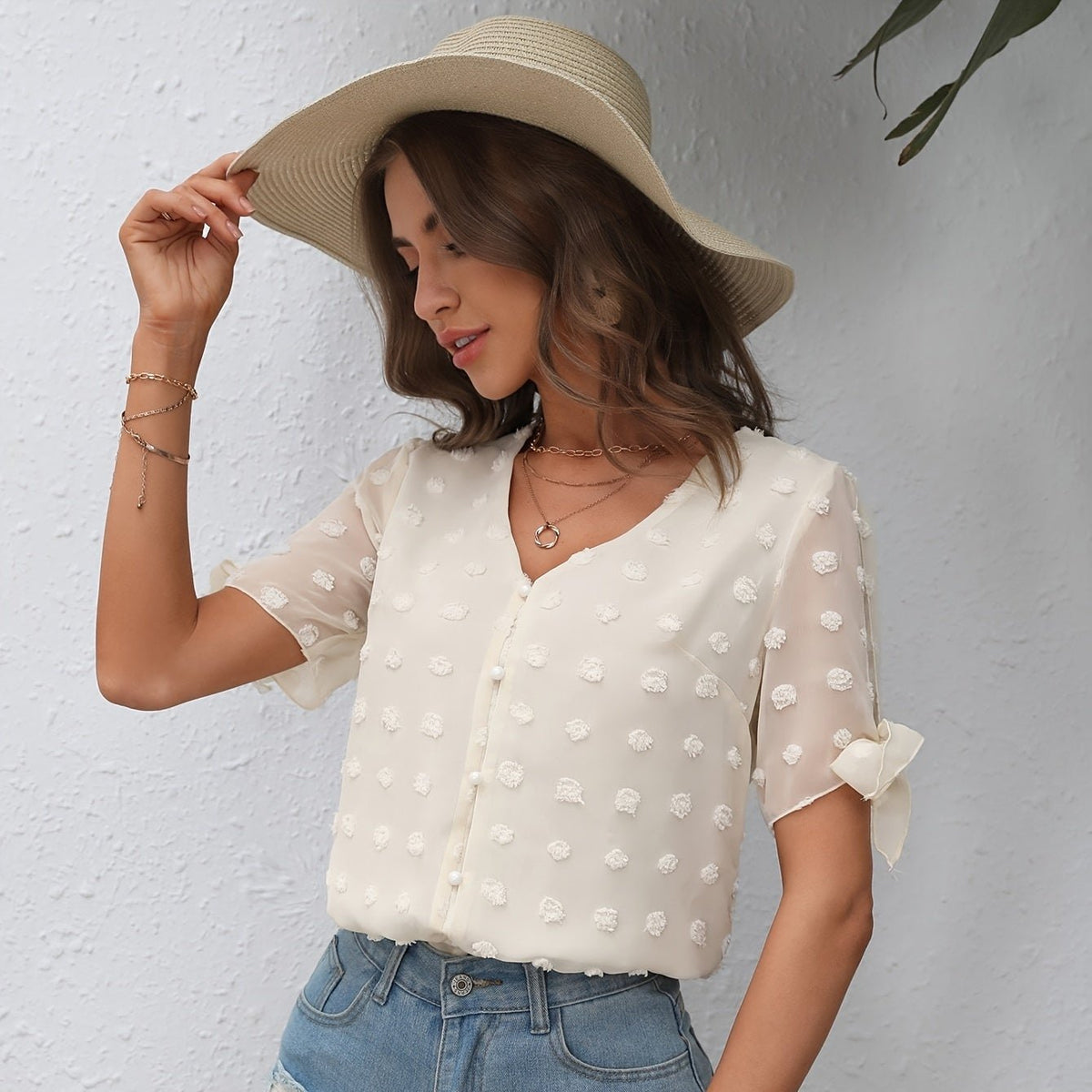 Blusa Swiss Dot com decote em V