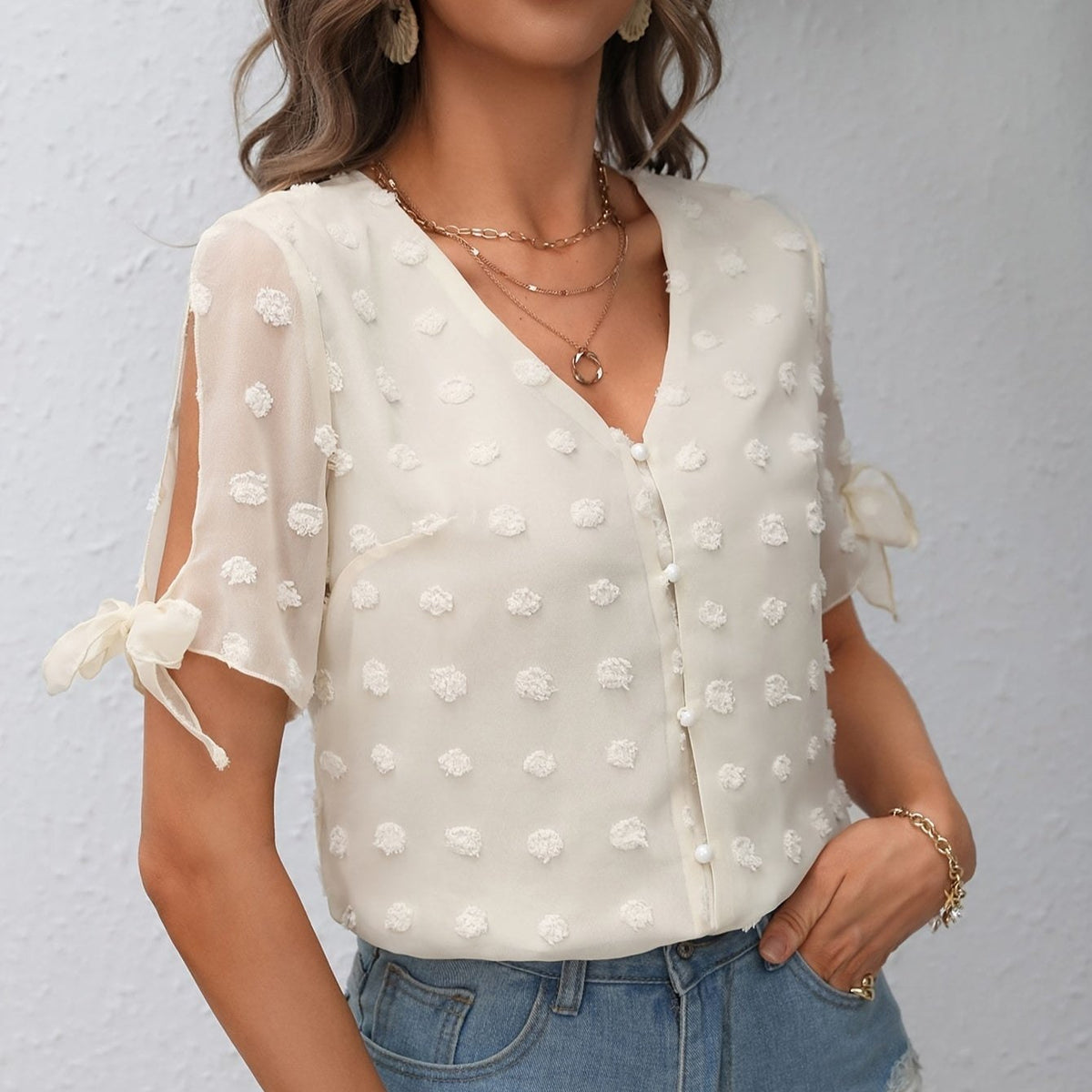 Blusa Swiss Dot com decote em V